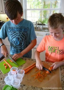 Kids cutting the carrots
